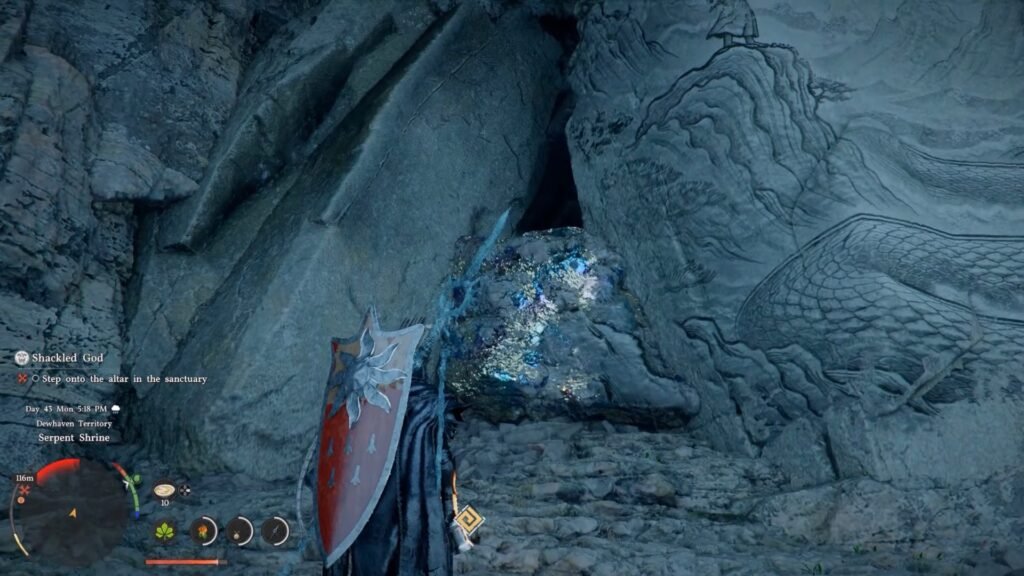 Entering the secret cave, blocked by a rock, at the Serpent Shrine.